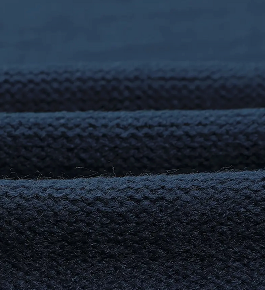 SLEEVELESS SWEATER
